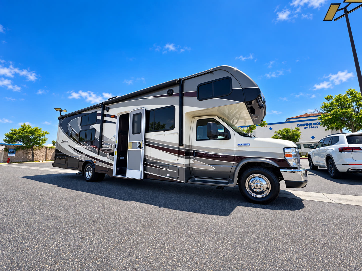 Front three-quarter exterior view of the Sunseeker RV parked at a dealership.